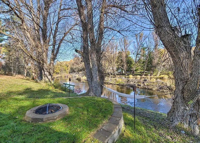 Riverfront Grayling Retreat W/ Fire Pit & Dock!